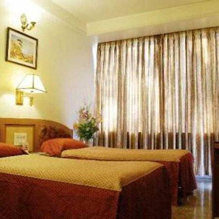 Hotel Mandakini Ambience Pune Chambre photo